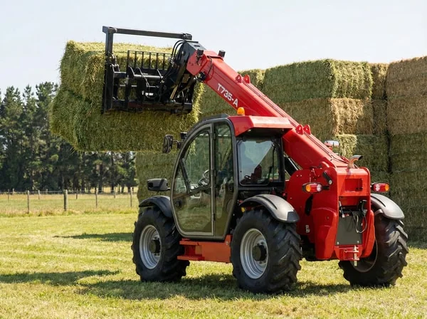 T735-A telehandler stacking bales on farm