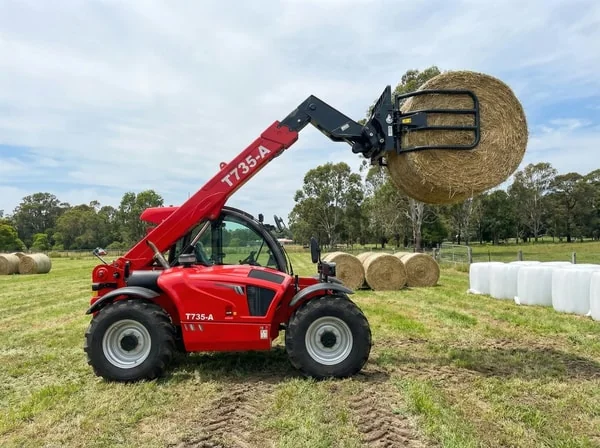 T735-A telehandler handling feed and silage on farm