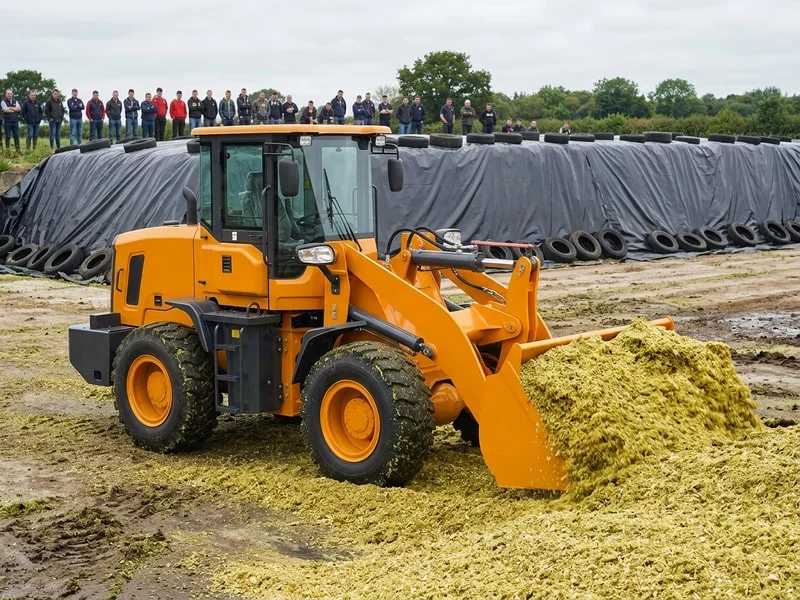 Wheel loader pushing silage on farm